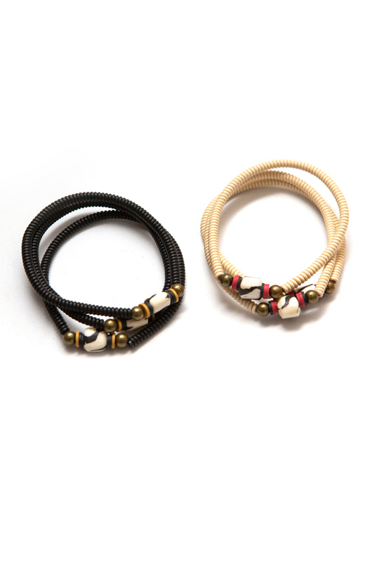 Telephone wire bracelet with bone bead
